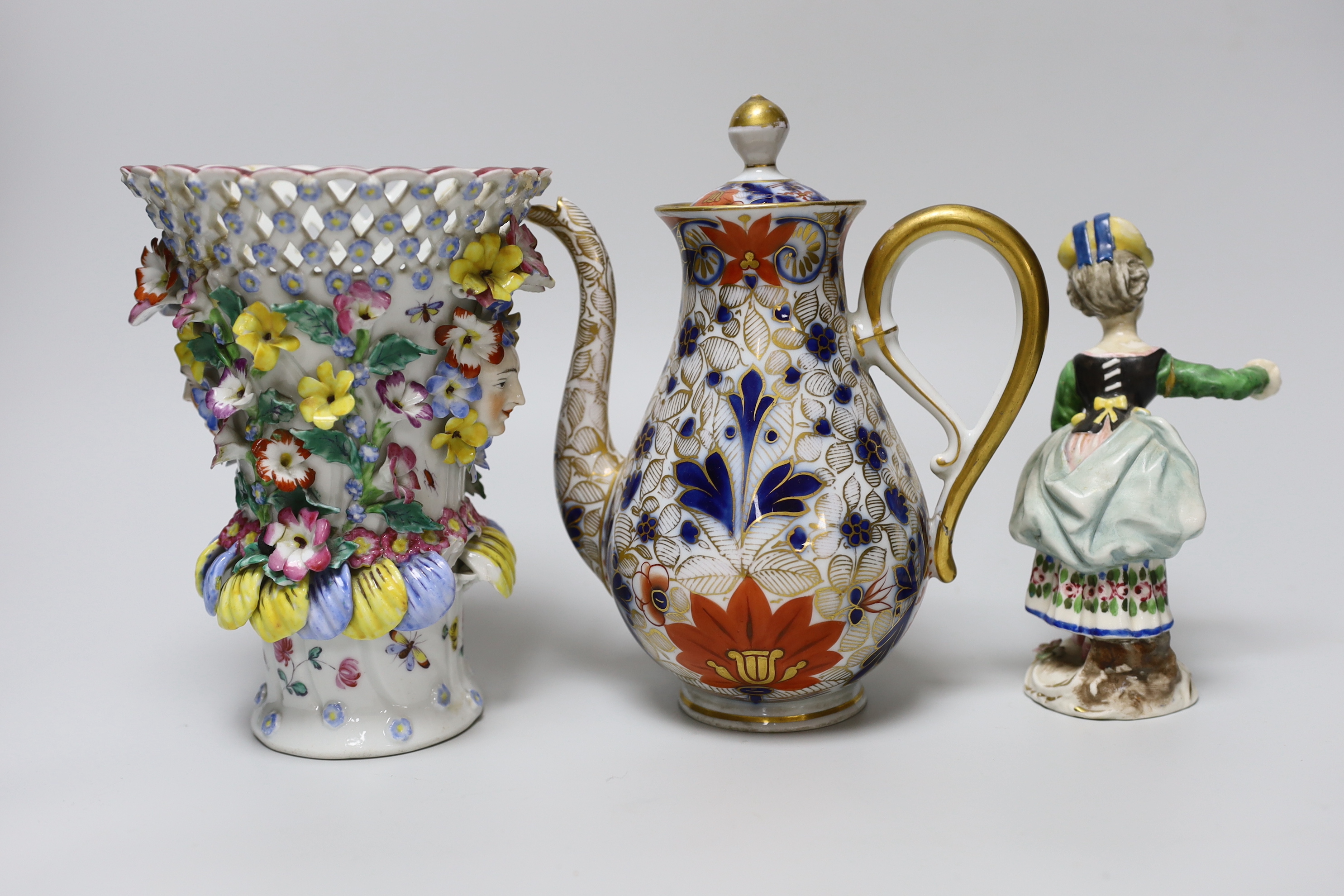 A 19th century German figure of a girl, 19cm, Vienna-type female figure, German figure of a boy and similar figure group, a continental coffee pot and an encrusted vase, the largest 18cm high